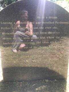 Erin is reflected in a grave stone that references Shakespeare's The Tempest